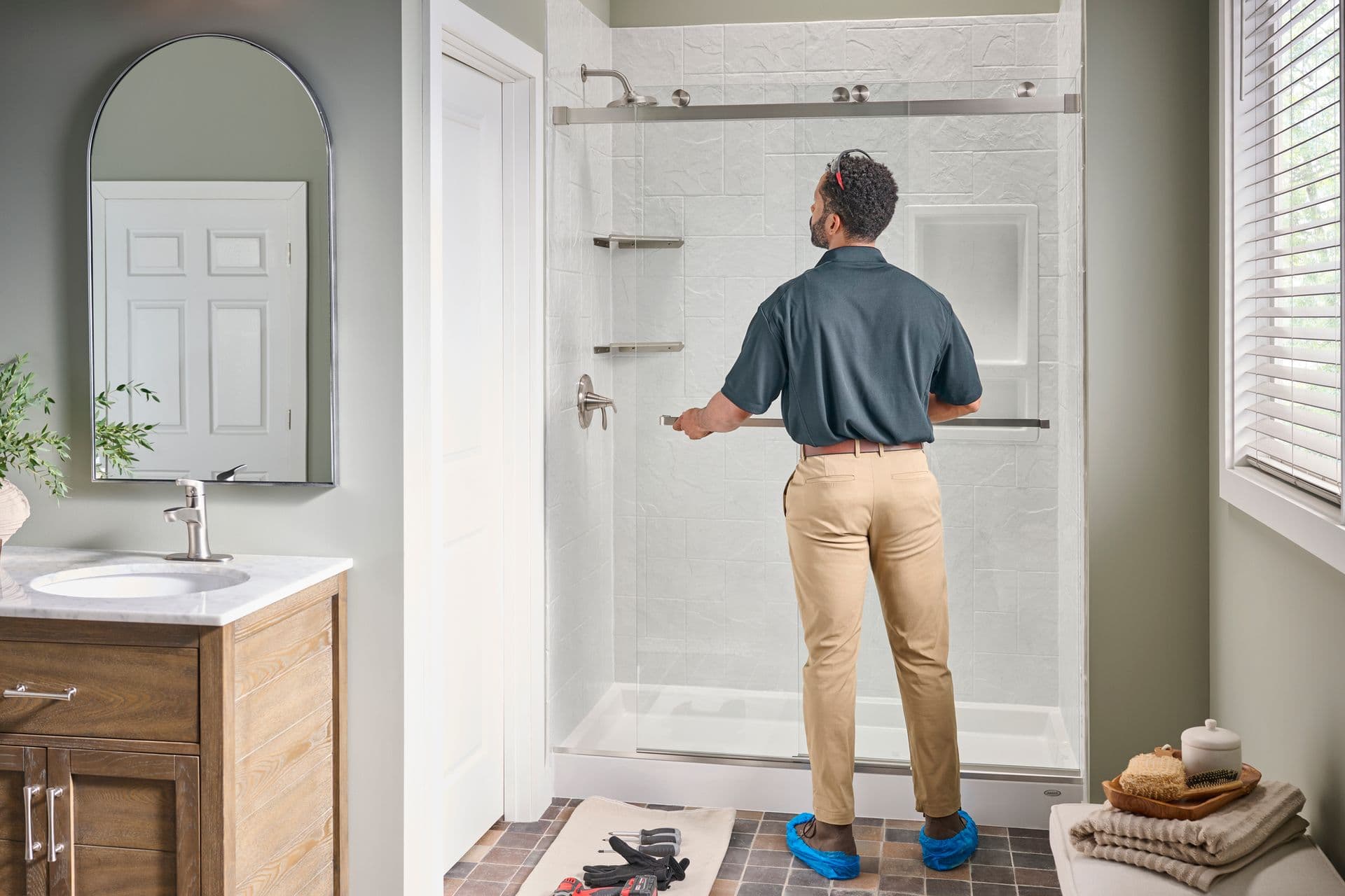 Shower and installer