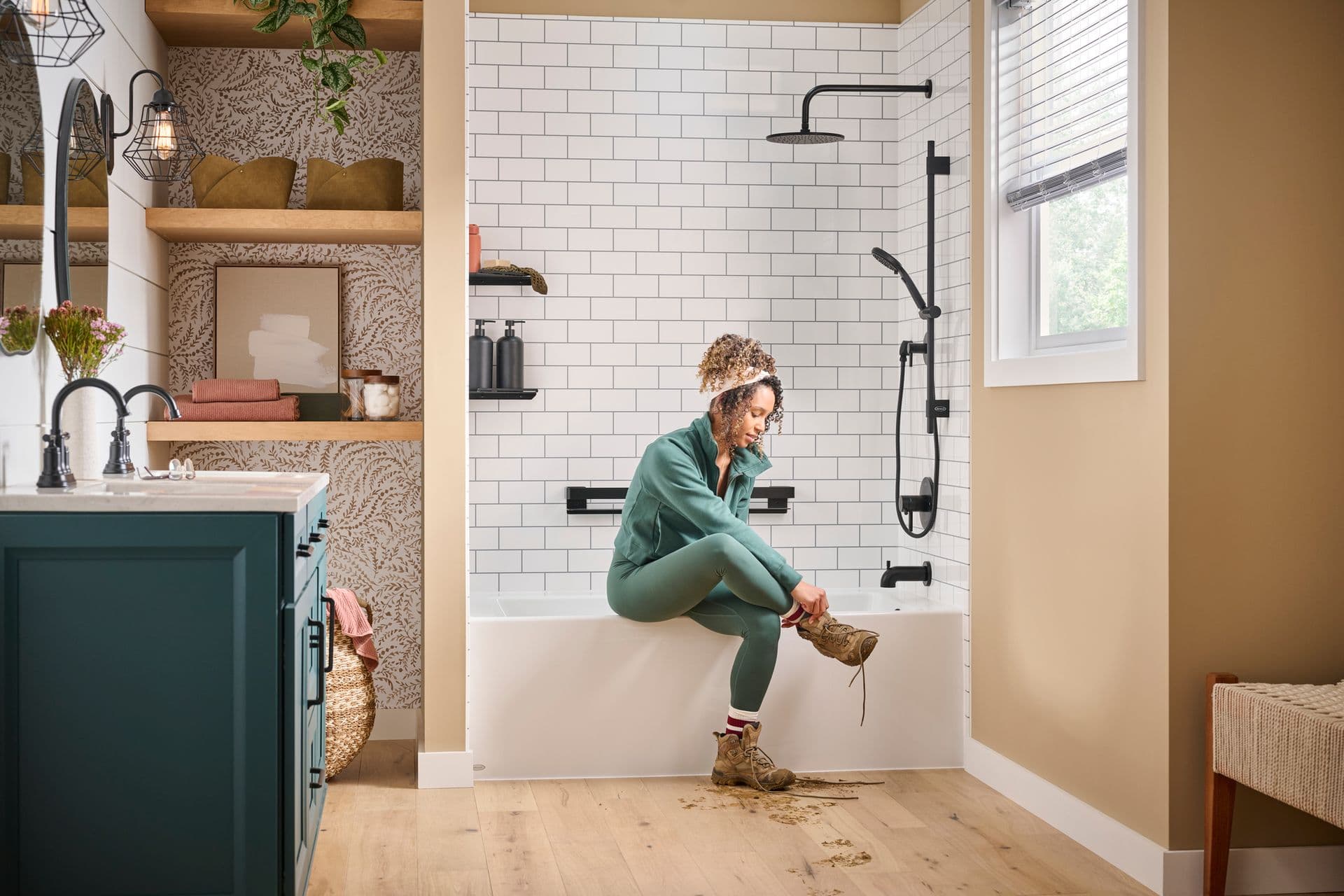 Bathtub - person sitting on edge of tub